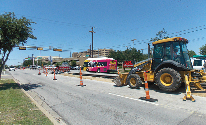 Workers complete Phase One of the Oak Cliff streetcar on Thursday, May 15. (Photos: Rick Lopez)