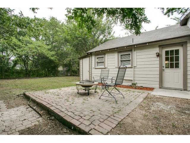 The Backyard Comes With  A Brick Patio That's Perfect For Grilli