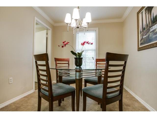 This Dining Room Features A New Chandelier, As Well As A Large W