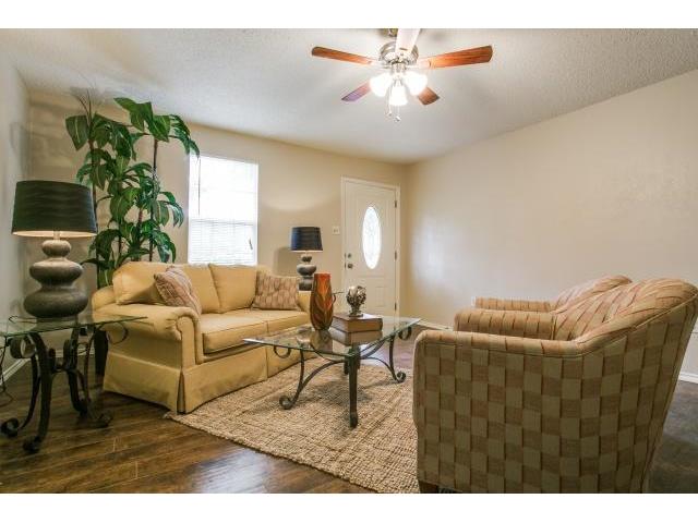 It Also Has Convenient Access To The Garage, Front Yard, Bathroo