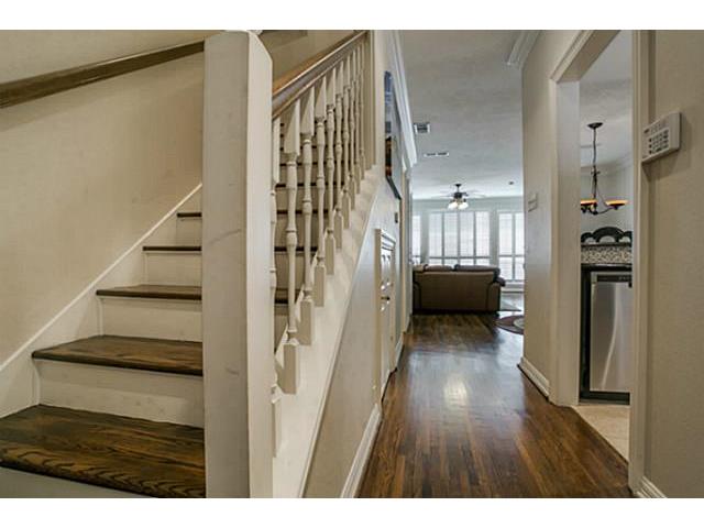 Entry with hardwood stairs