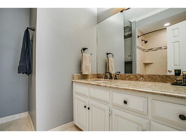 Master Bath with Onyx counter and Egyptian limestone