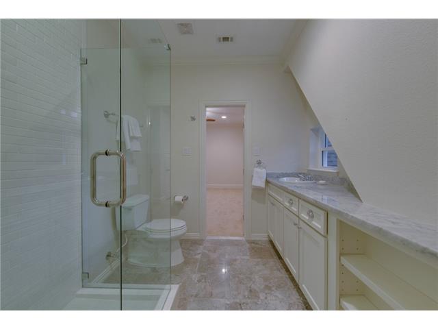 Jack and Jill bath on second floor with marble floors.
