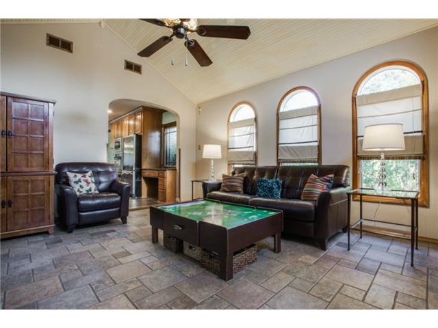 Den or famiy room located at the rear of the home.
