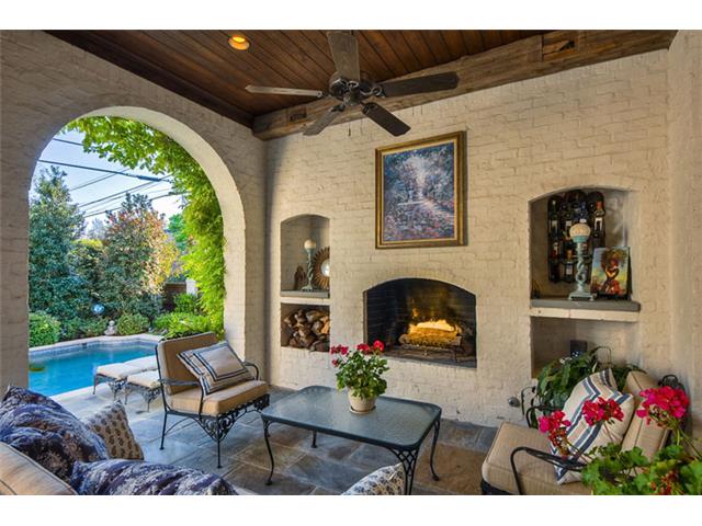 Even an outdoor fireplace & sitting area. A great outdoor room c