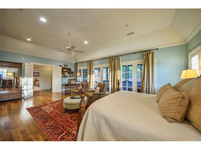 Generously sized, this space is comfortably furnished with king-