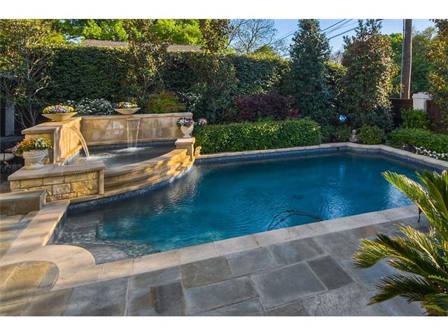 the pool deck is large enough for furnishing. The spa fountain e