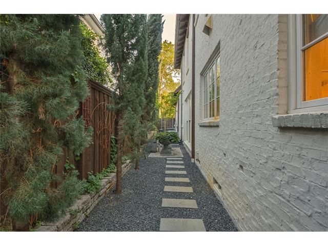 Every inch of this property is lushly landscaped...even the side