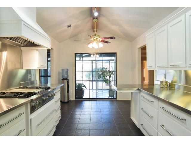 Kitchen breakfast room opens to sunroom