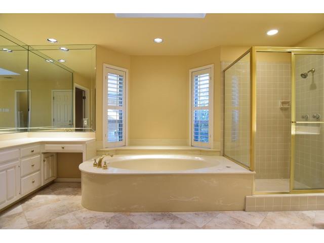 Updated floor, mirrors & plantations in master bath