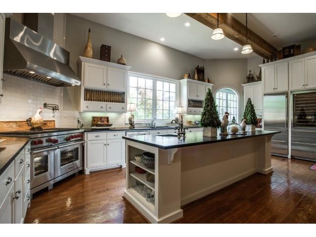 State of the art kitchen with top of the lineappliances, pot fil