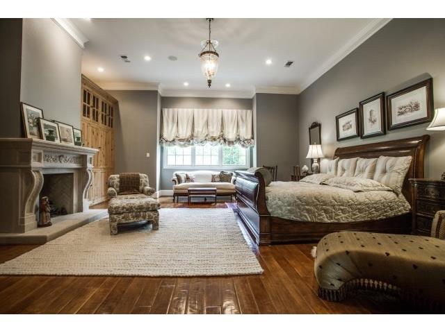 Spacious master with fireplace and sitting area.