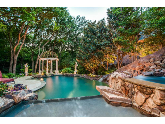 The tranquil backyard has the feel of a mountainside resort that