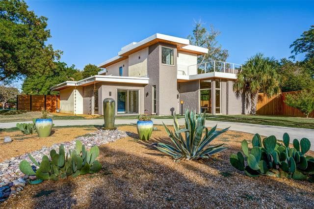 Do yourself a favor and say yes to this stunning Frank Lloyd Wright-inspired treasure in the Preston Royal Northwest Neighborhood.
