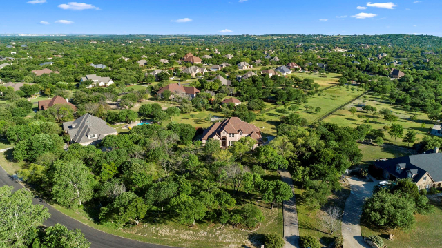 141 Coronado Bend has 3 acres of open field in back - that's part of HOA