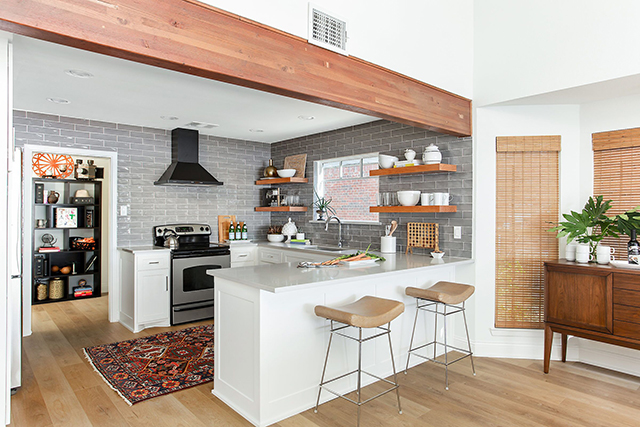 Among the lake house's kitchen renovations: new cabinetry, tiling, and countertops.