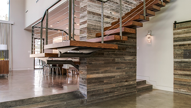Reclaimed wood is a theme throughout the home.