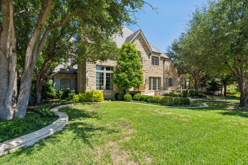 With Updates That Carry Forward, This Riverhills Manor House is One of