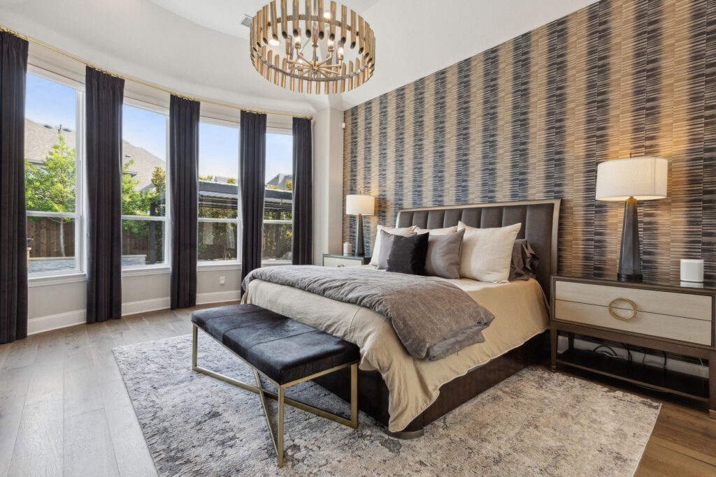 primary bedroom with dramatic wallpaper