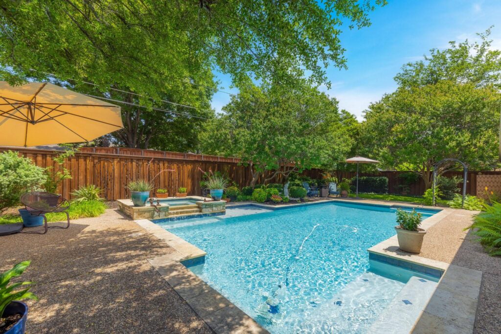 ranch style home backyard pool